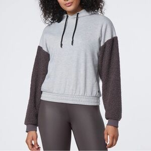 Cozy pullover hooded sweatshirt with Sherpa sleeves